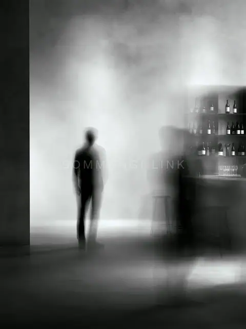 Lone figure at the bar